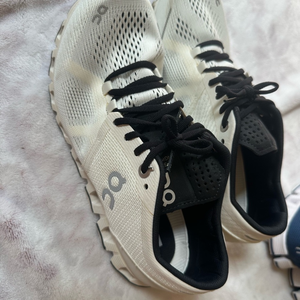 On Running Black and White Athletic Shoes